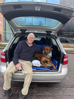Kobe in the back of car